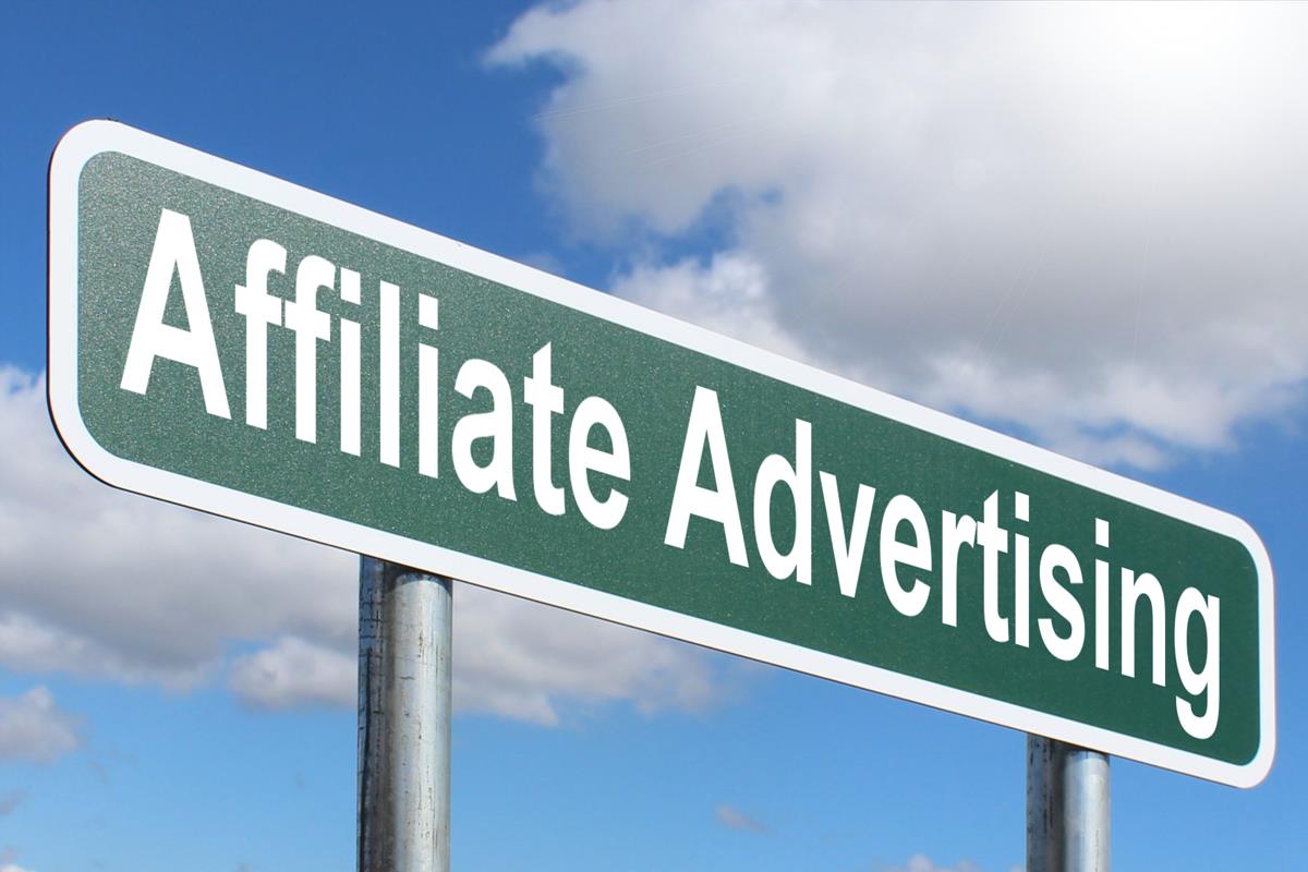 A content creator working on affiliate marketing materials across various platforms