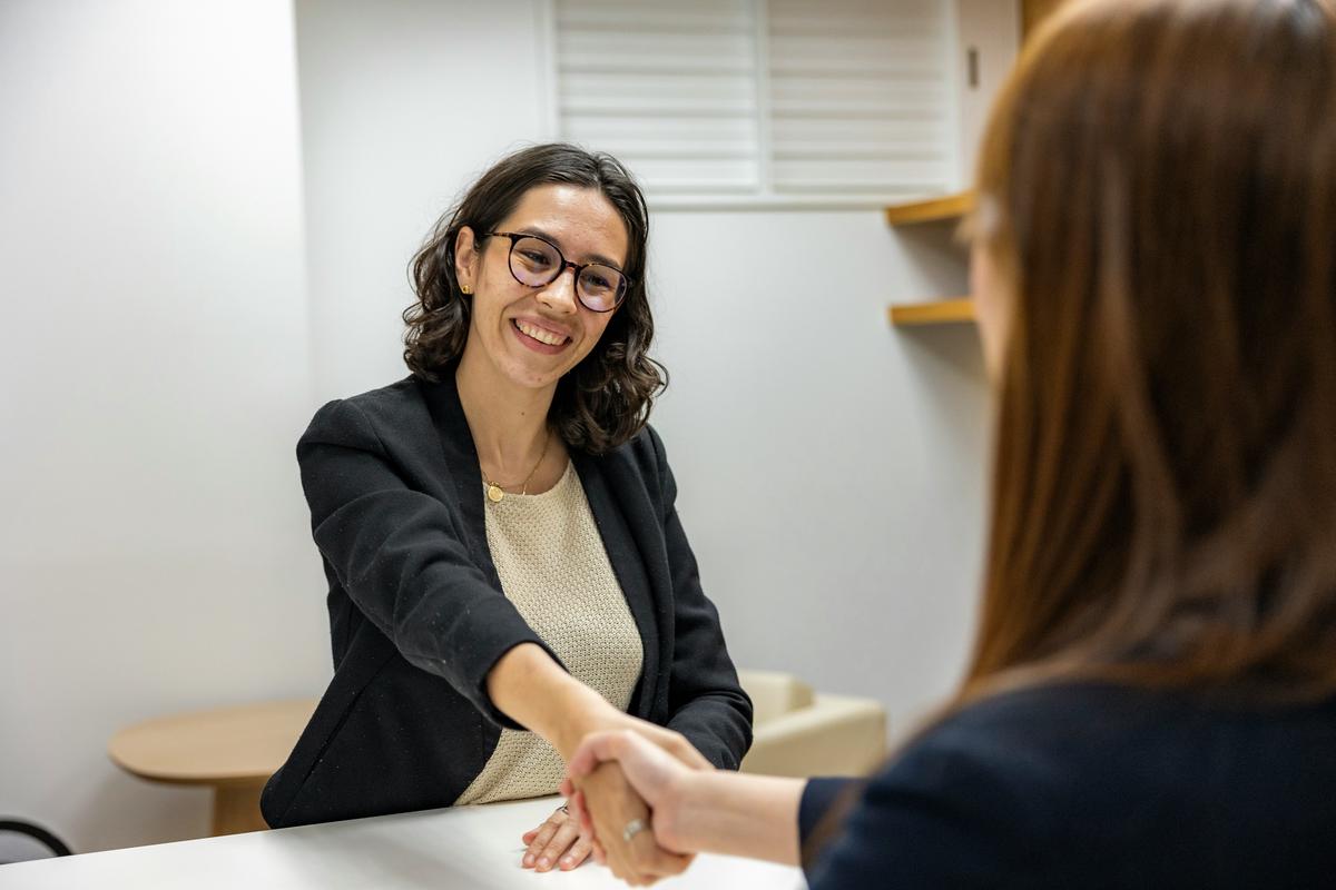 A job seeker receiving professional guidance from an employment agency representative