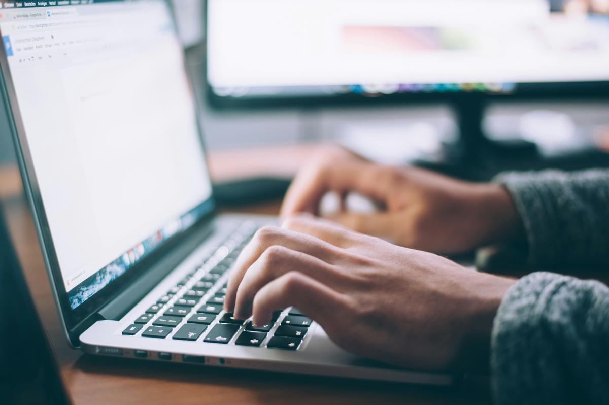 A person browsing multiple reputable online job platforms on various devices